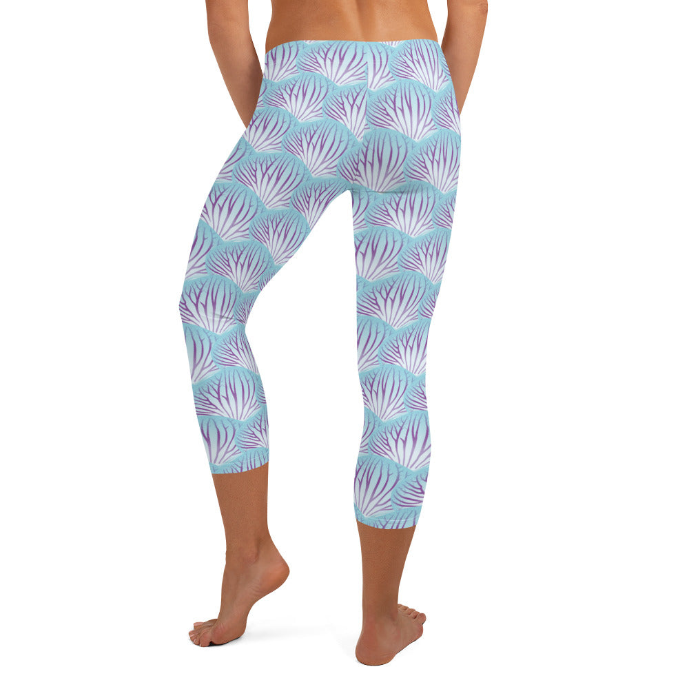 Woman modeling the Orchid Petal printed apri leggings from the rear.
