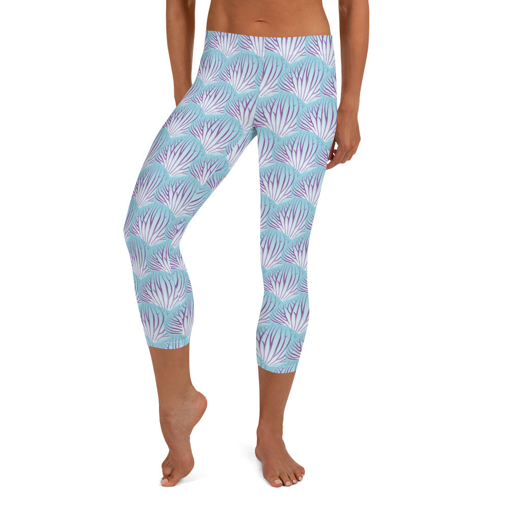 Woman modeling the Orchid Petal printed apri leggings shoeless form the front.