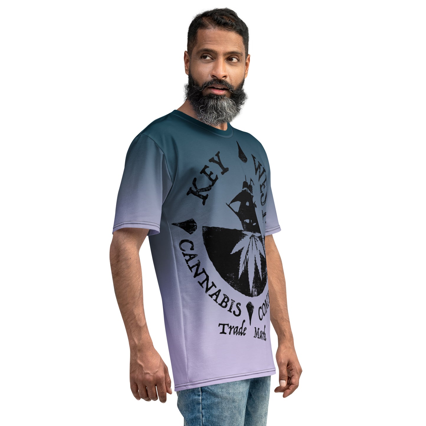 Man modeling the Key West Cannabis Company Brand T-shirt with oversize print on a gradient background from the right quarter.