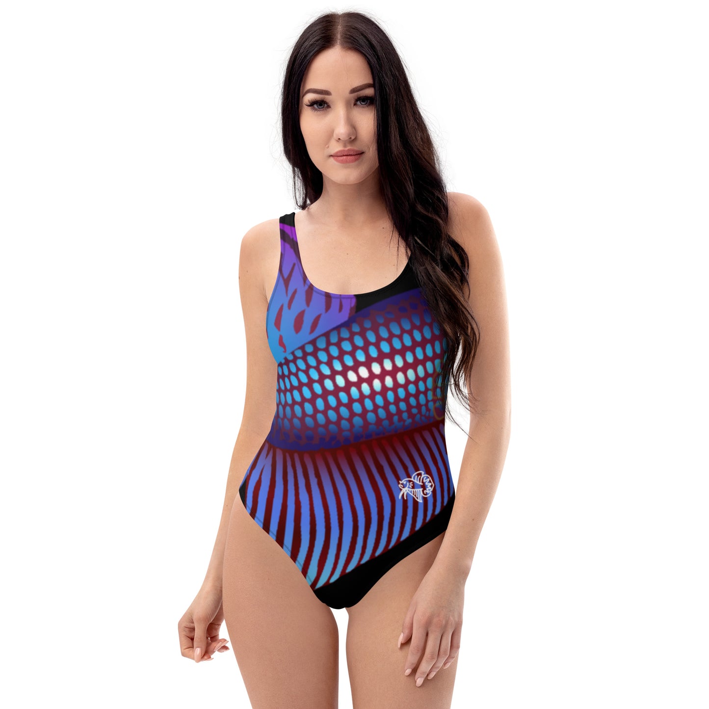 Woman Wearing the Betta Ka 1 piece swimsuit in purples, reds, and blue patterns from the front.