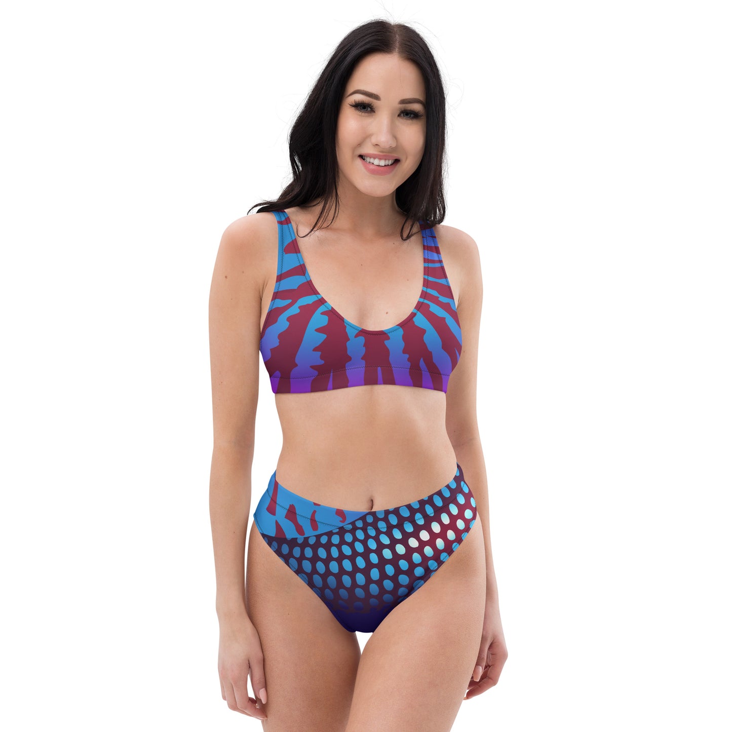 Woman modeling the Betta Ruk Bakini Swimsuit in purples, reds, and blue patterns from the front.