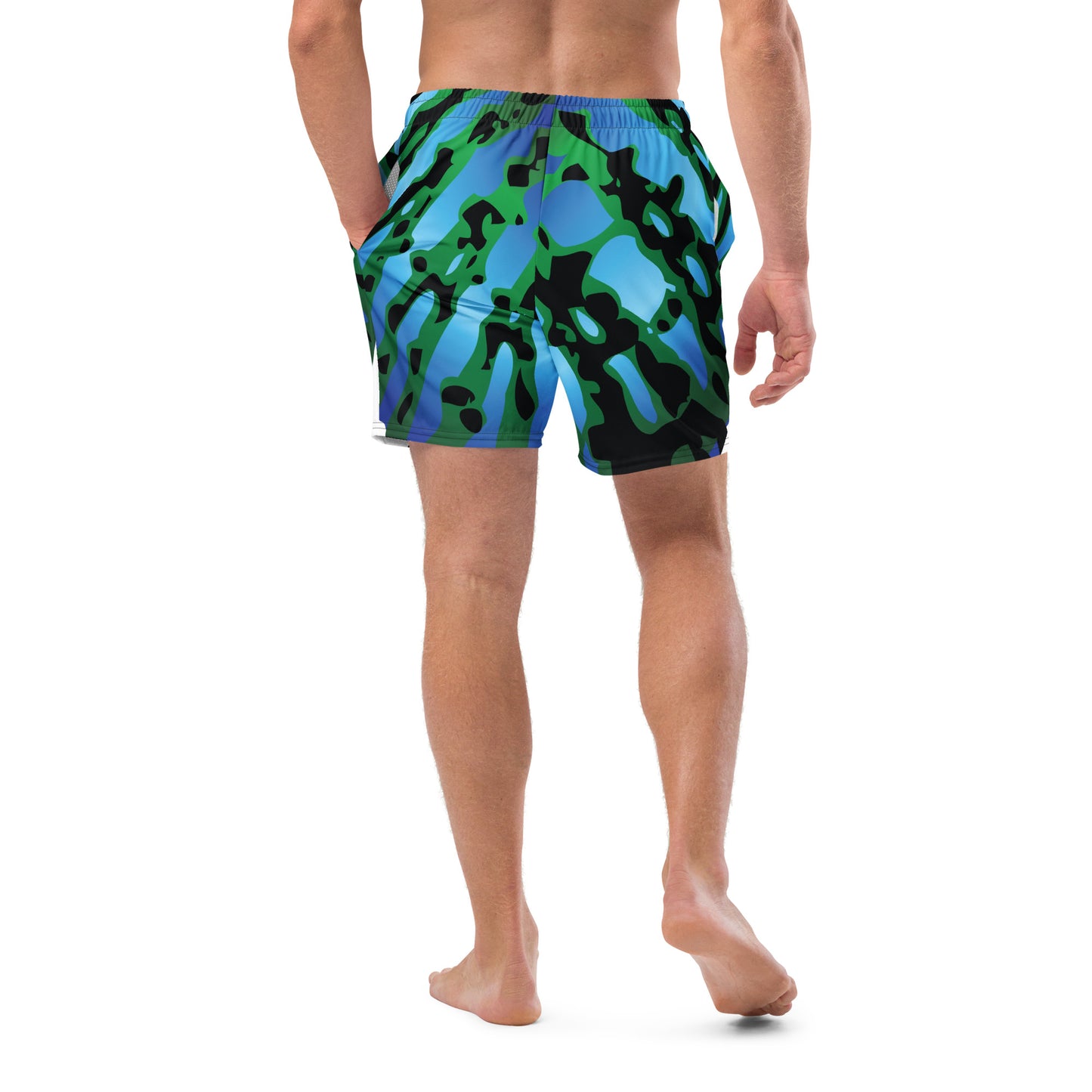 Close up of Man modeling the Betta Muay Swim trunks from the back in Blues, Greens, and Black.