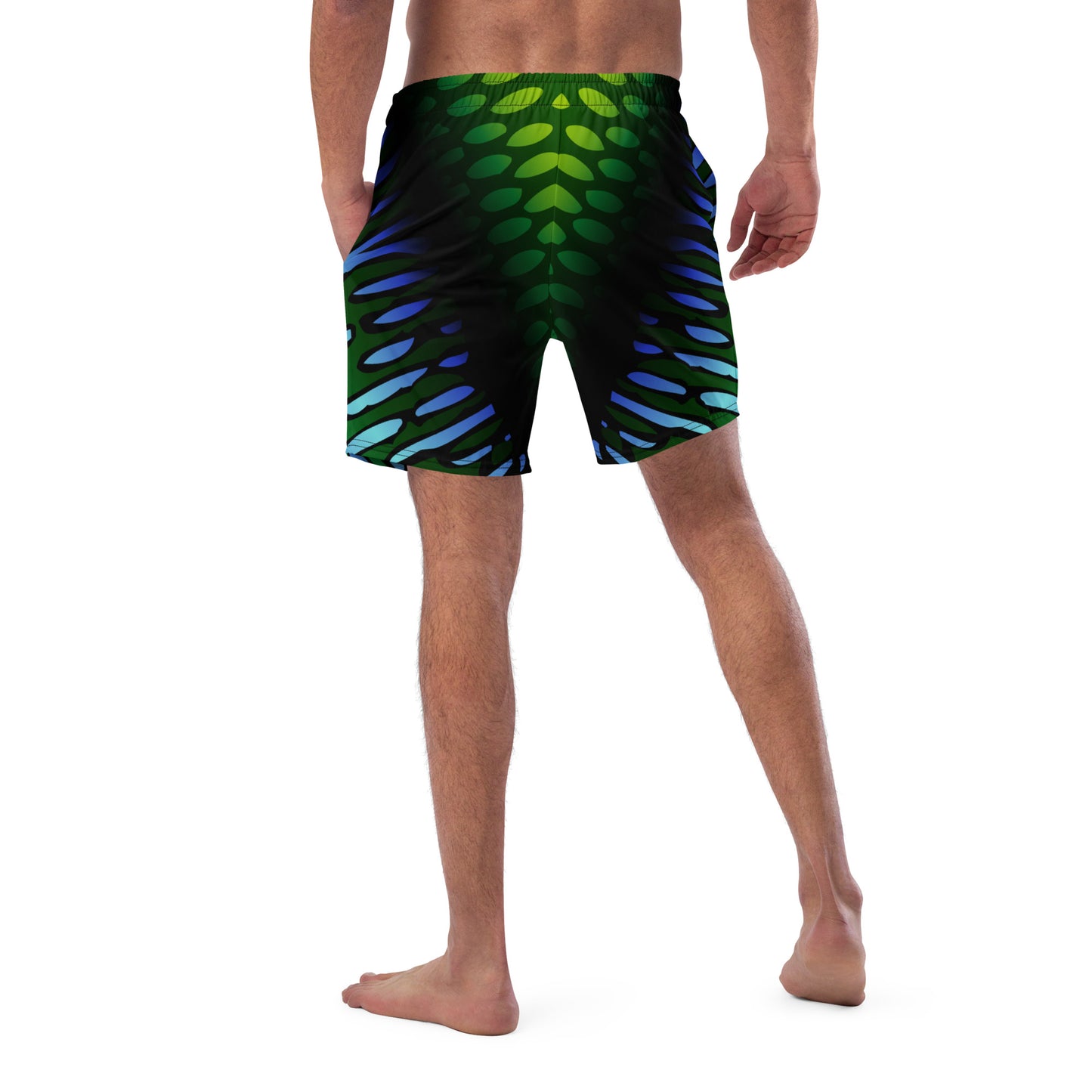 Male model wearing the Betta Yak Mens swim trunks in blue and green from the rear.