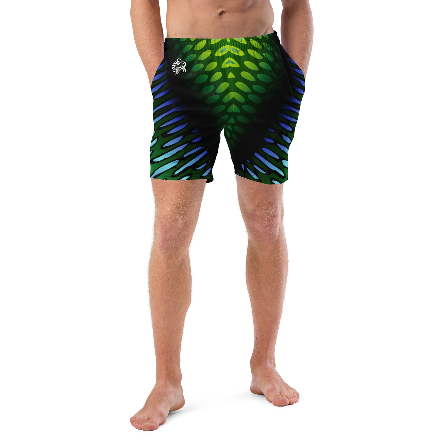 Male model wearing the Betta Yak Mens swim trunks in blue and green from the front.