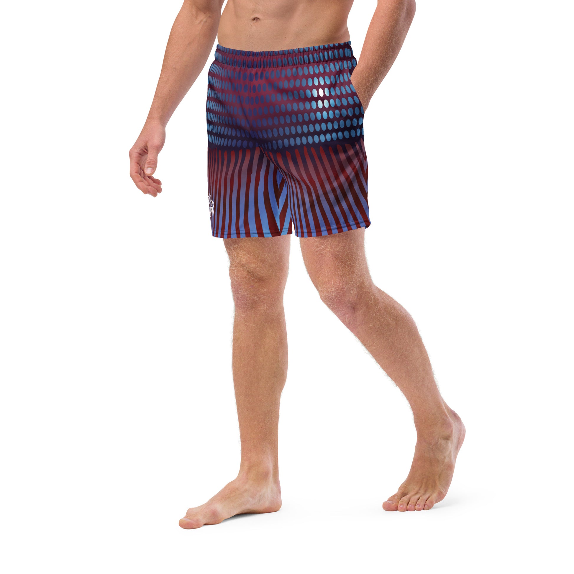 Close up of Man modeling the Betta Kang Swim trunks from the front-side in Blues, Purples, and Deep Reds.