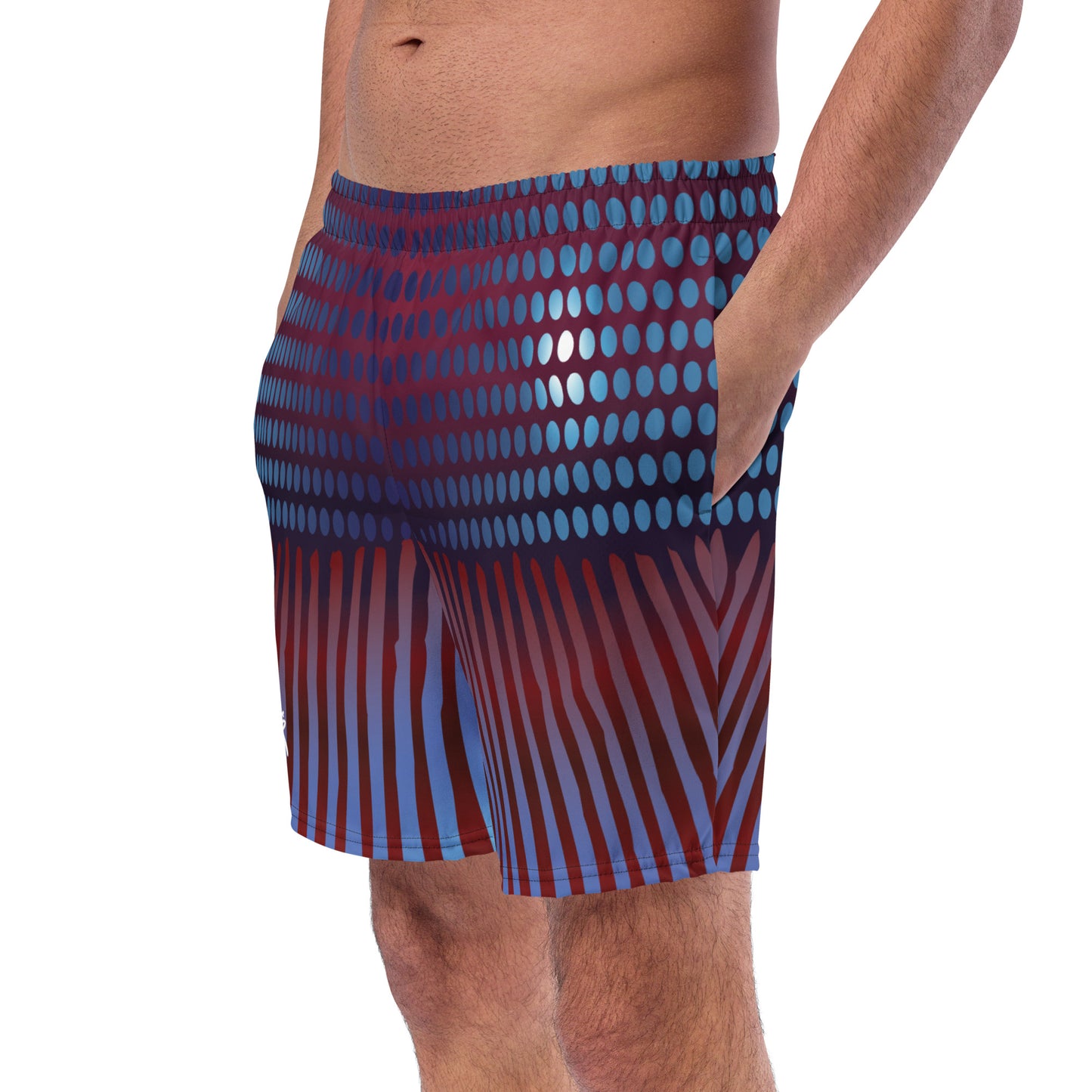 Close up of Man modeling the Betta Kang Swim trunks from the front-side in Blues, Purples, and Deep Reds.