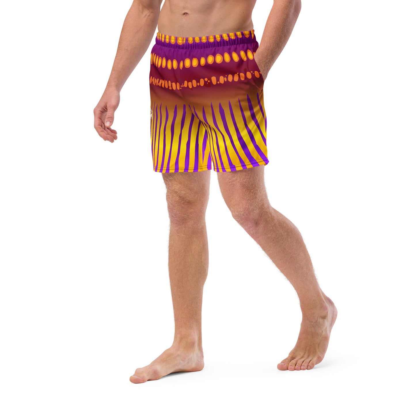 Man modeling the Betta Jet Swim trunks from the side in purples oranges yellows and maroon.