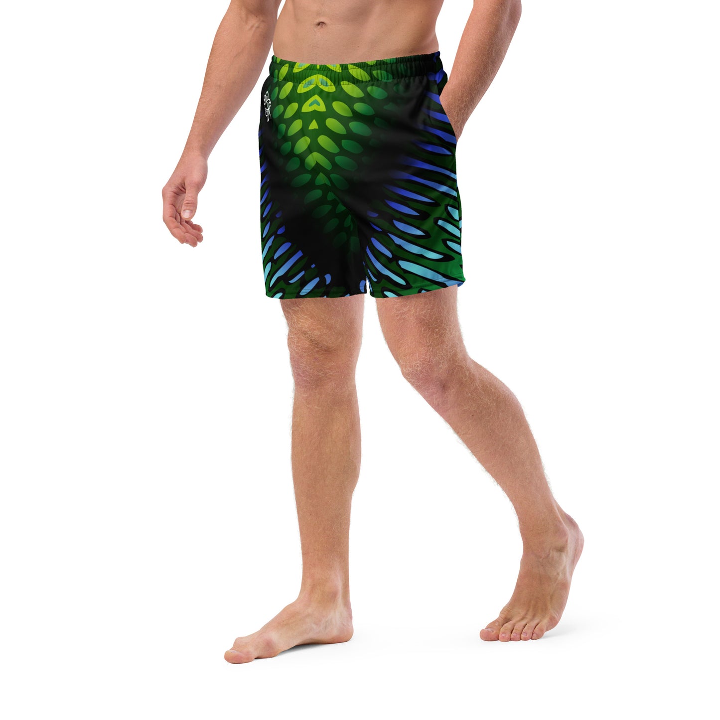 Male model wearing the Betta Yak Mens swim trunks in blue and green from the front left side.