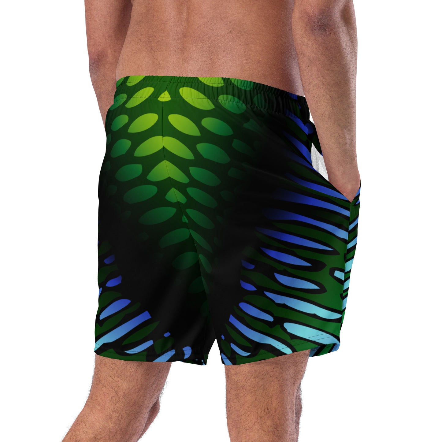 Close up of male model wearing the Betta Yak Mens swim trunks in blue and green from the right back.