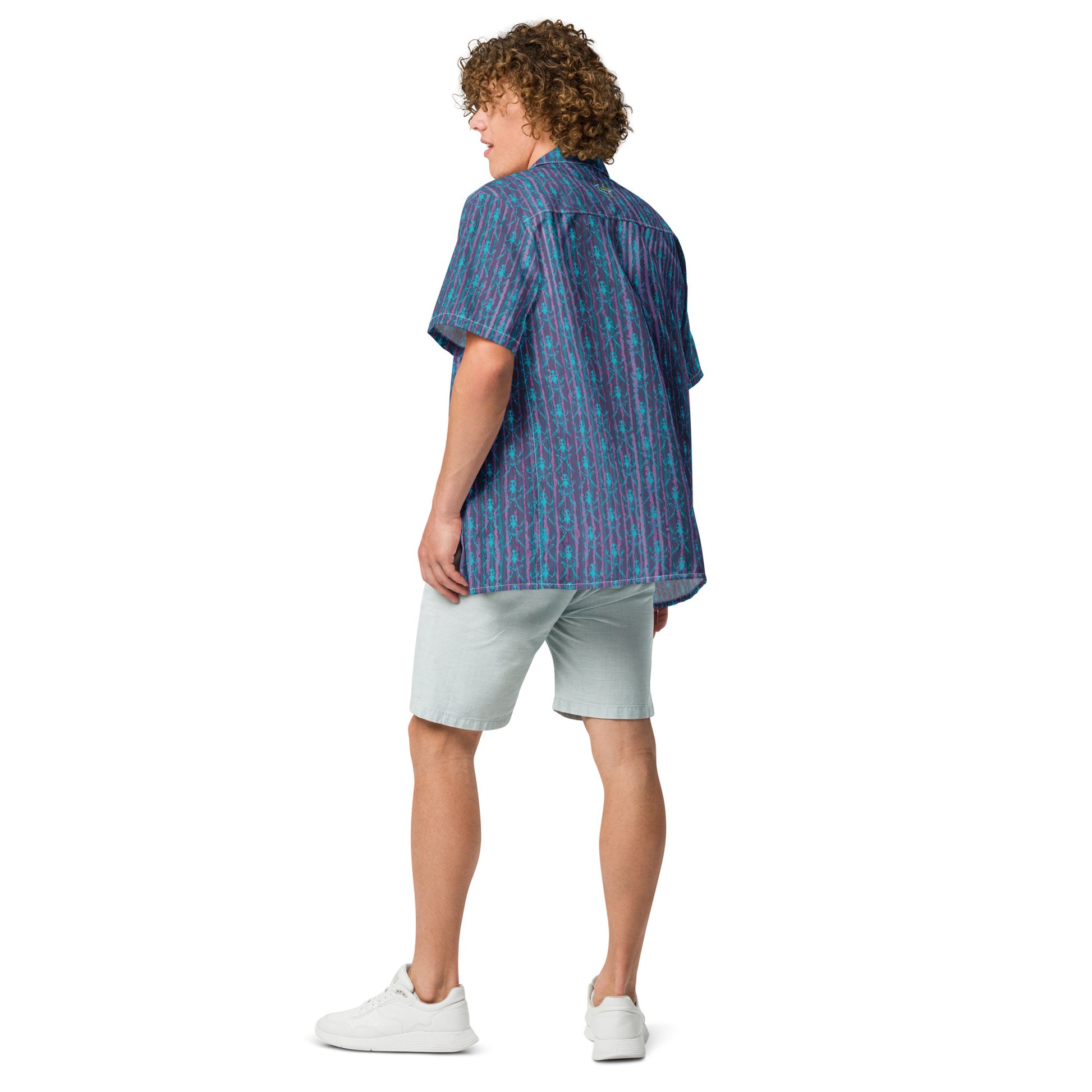 Model wearing the Anura button down shirt with turquoise frog bones from the rear.