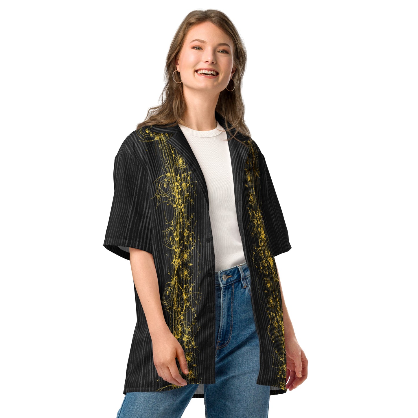 Woman modeling the Anura Theta Button Shirt from the side front showing the gold  particle energy design.