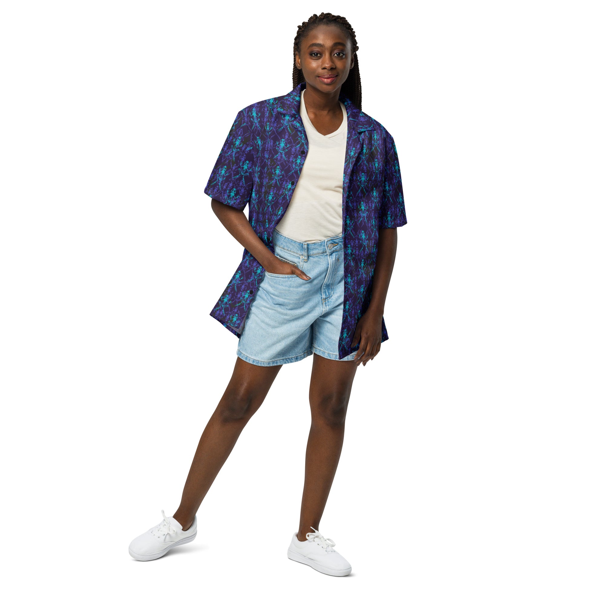Model wearing the Anura Zeta Button down shirt with purple black and turquoise frog bones.