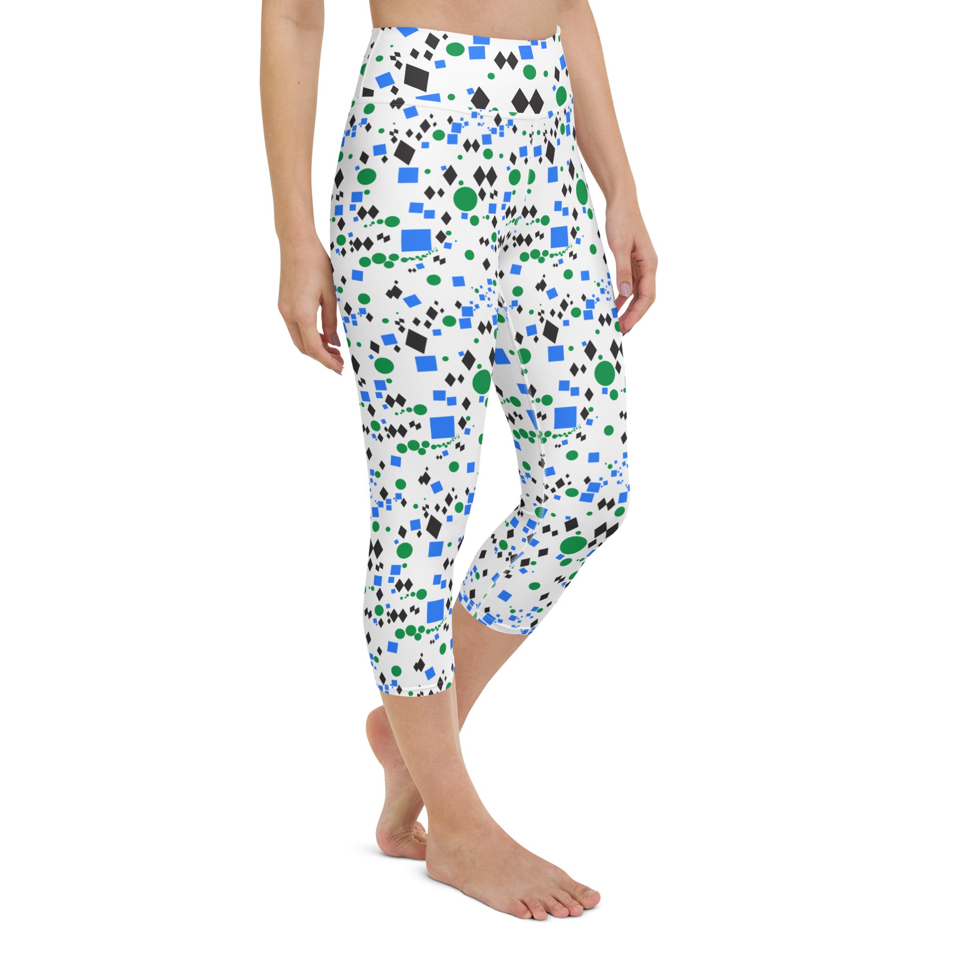 Woman modeling the Trail Marker capri leggings from the right front quarter.