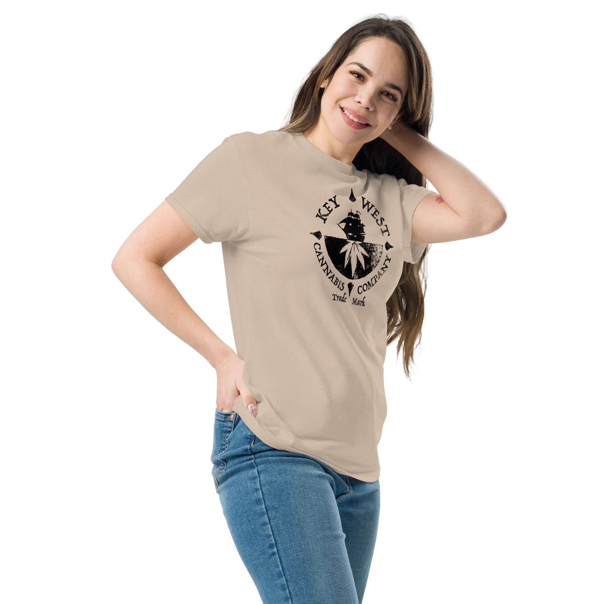 Woman modeling the Key West Cannabis Company Brand graphic in black on a Sand Color T-shirt from the right front.