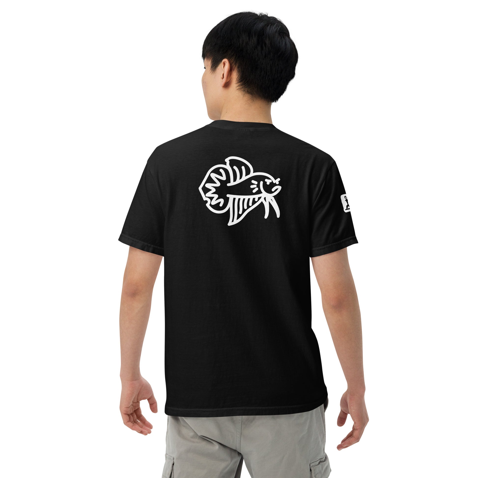 Male Model wearing the black Betta Si fighting fish T-Shirt from the back showing the bad betta character illustration.
