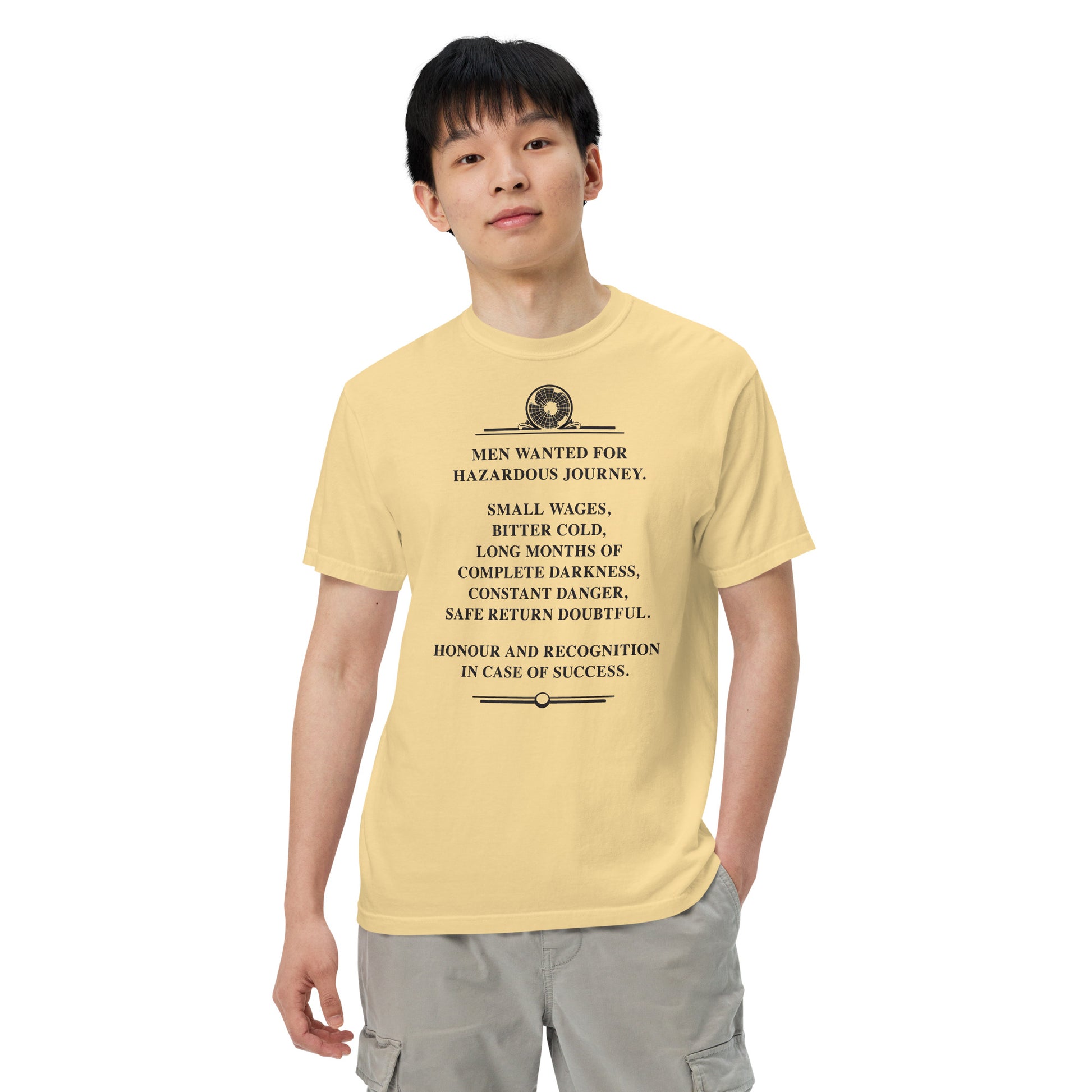 Model with hand in pocket wearing the Constant Danger T-Shirt in black on bananna color from the front.
