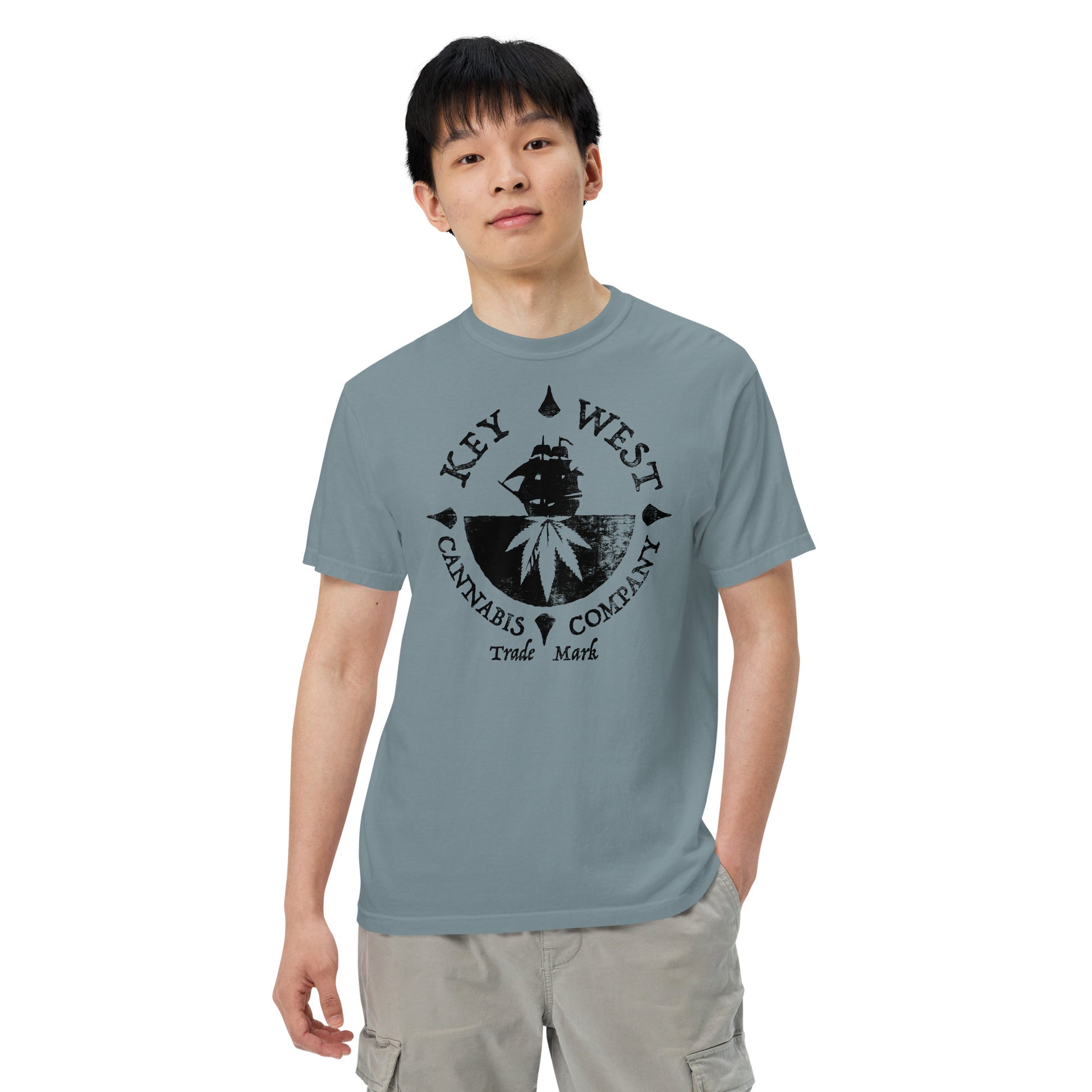 Man modeling the Key West Cannabis Company Brand T-shirt in Ice Blue from the front.