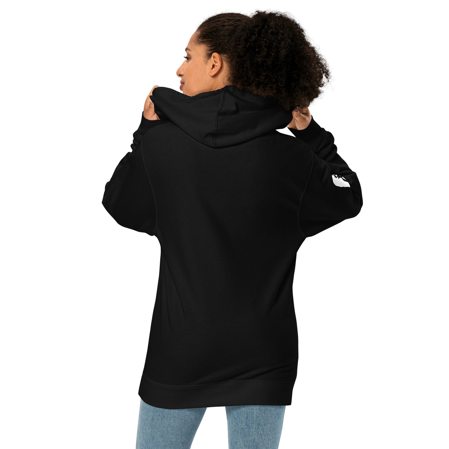 Female model wearing the Anura Sigma hoodie in black from the back showing the sleeve print.