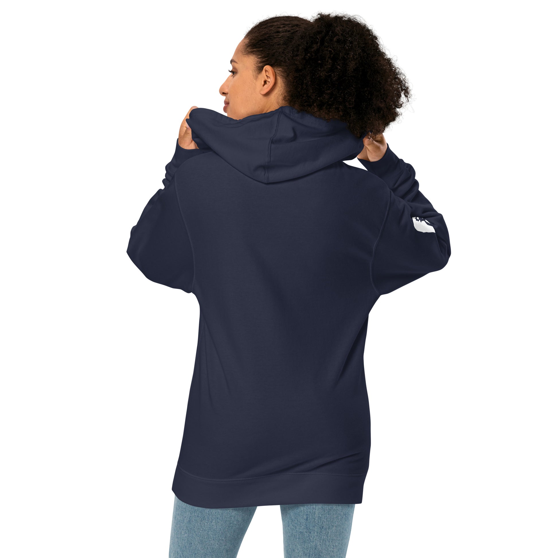 Female model wearing the Anura Sigma hoodie from the back in Navy blue showing the left sleeve print.